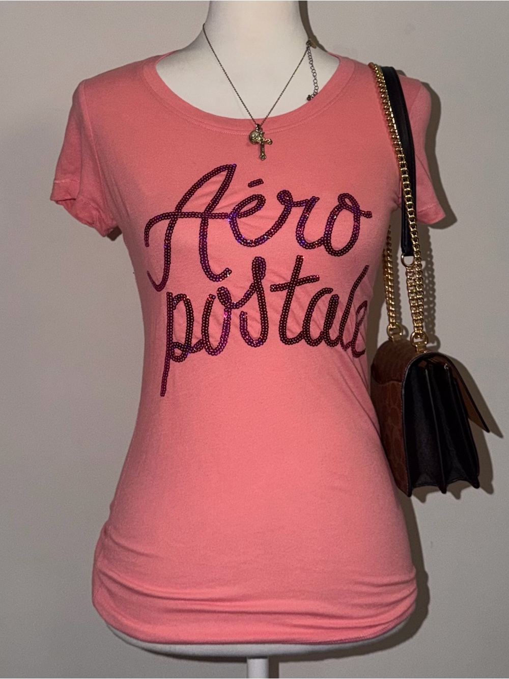 2000s vintage style pink 2015 aeropostale baby tee with sequin cursive spell out